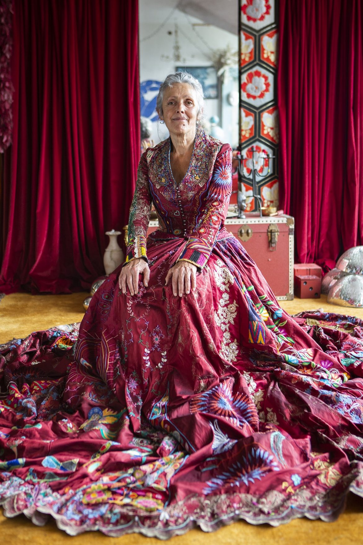 This ornate red dress took 13 years and 353 artists in the making