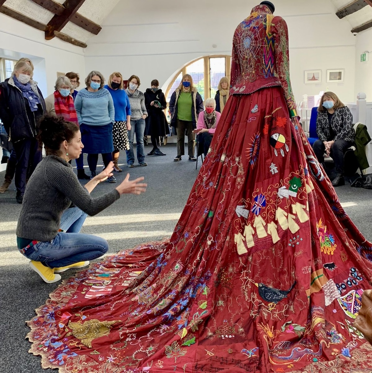 This ornate red dress took 13 years and 353 artists in the making